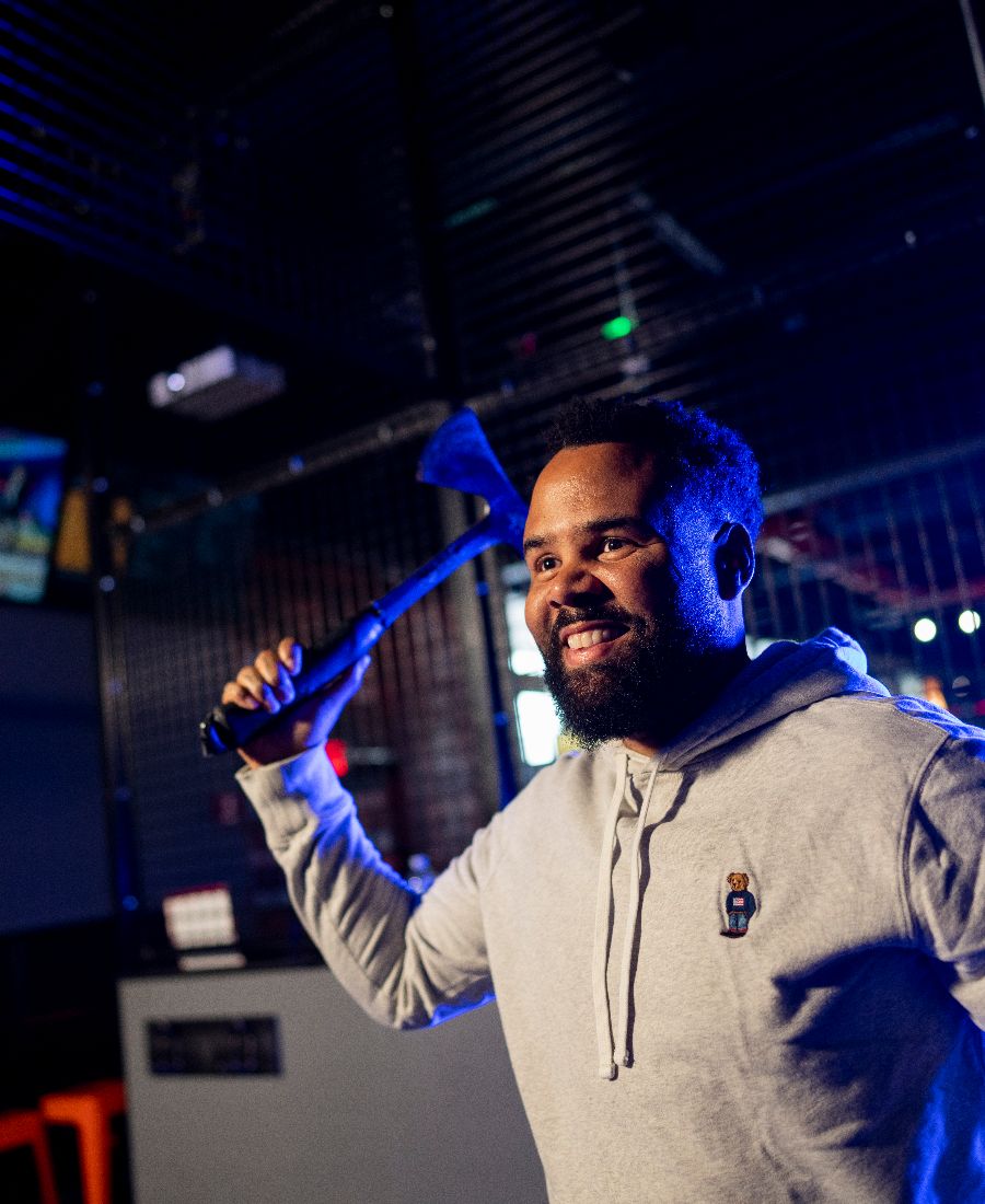 Guest throwing an axe at Q-AXE